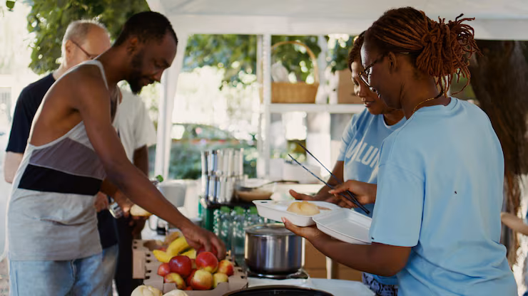 Community members receiving food support